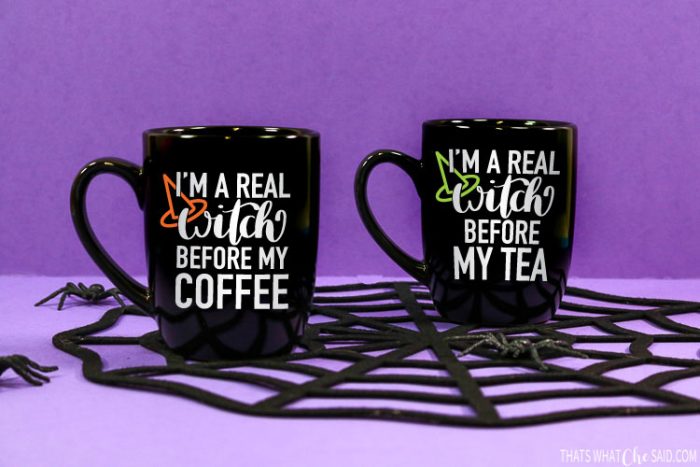 2 Black Coffee mugs with "I'm a real witch before my coffee or tea on them with vinyl