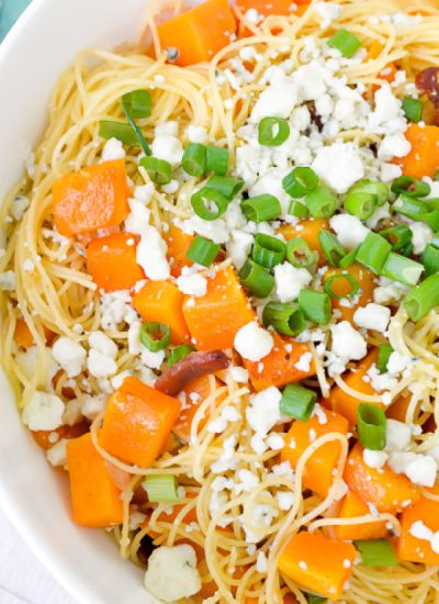 Close up view of butternut squash pasta with bacon and blue cheese