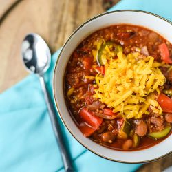 Bowl of Vegetarian chili with cheese made in the instant pot