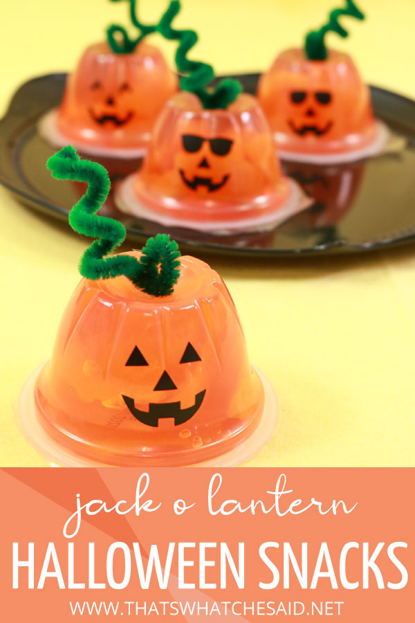 Orange fruit cups with vinyl jackolantern faces to make Halloween snacks