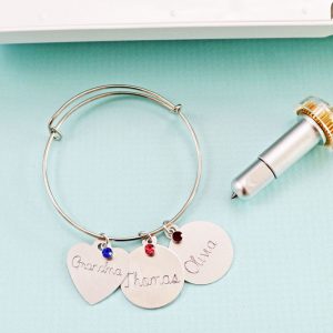 Engraved charm bracelet using the Cricut Maker