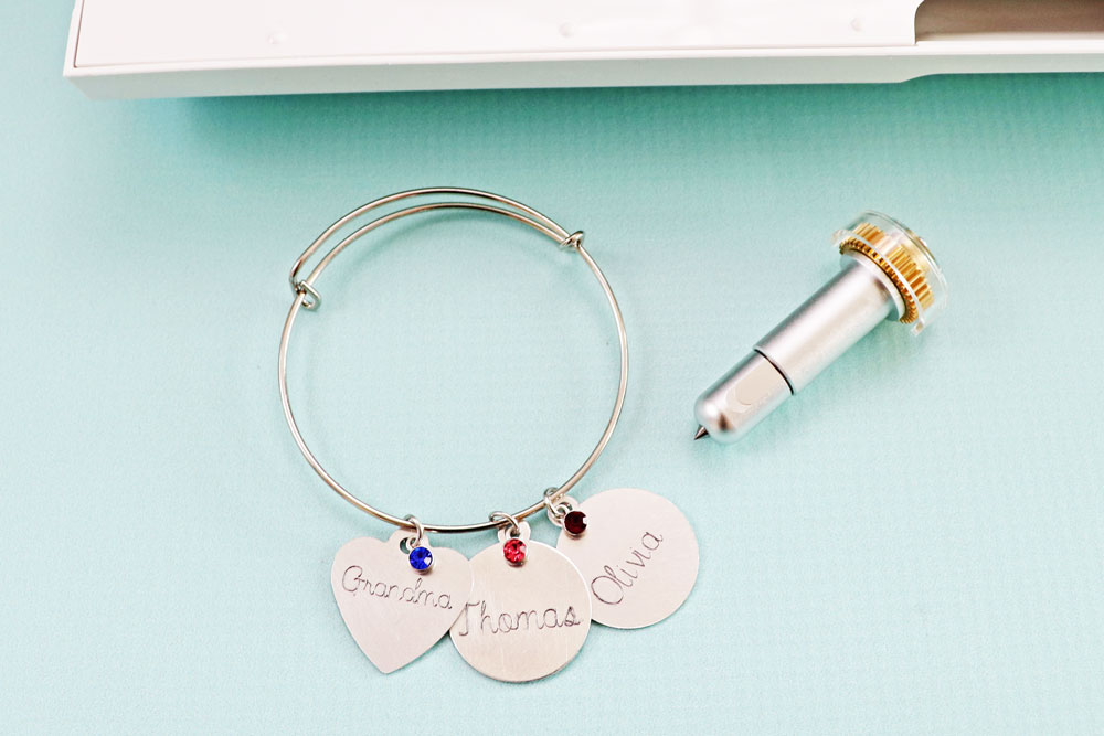 Engraved charm bracelet using the Cricut Maker