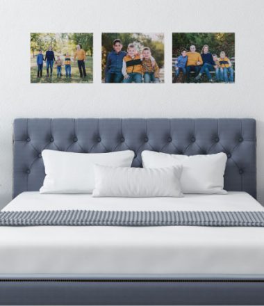 Bed with three 16x20 Canvas on Demand Canvases displayed