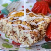 Cinnamon Roll French Toast Bake Close up with Icing being drizzled