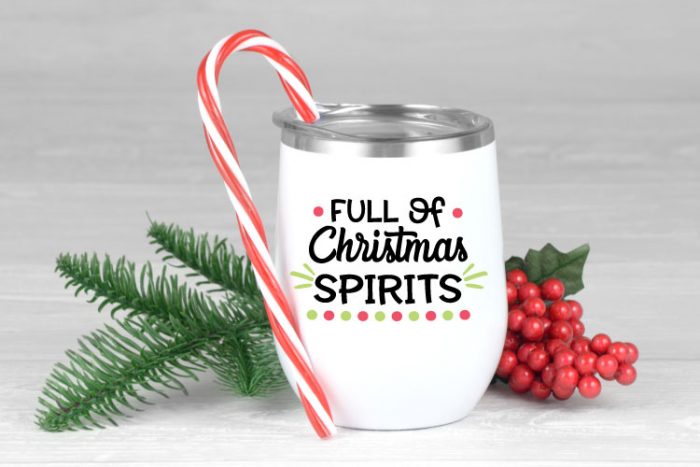 White insulated wine tumbler with "Full of Christmas Spirits" in black, red and green adhesive vinyl