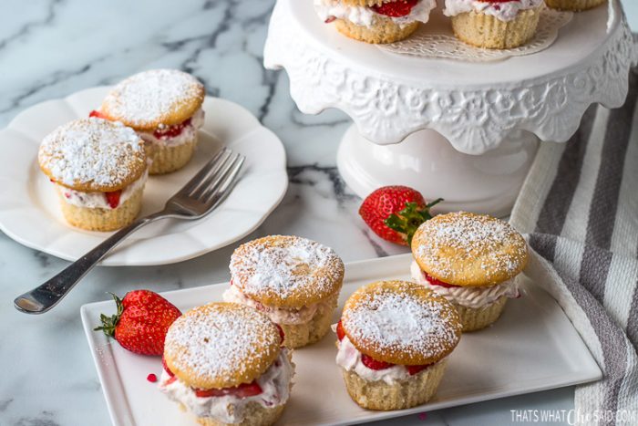 Plates and platters showcasing the finished Strawberry Cream Cupcakes