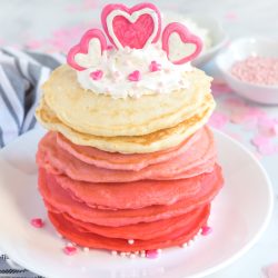 Red to Pink to White Ombre Pancakes with Valentine chocolate heart decoration on top