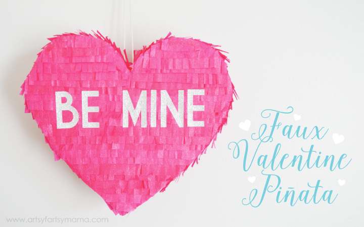 Heart Pinata made with foam board and tissue paper to look like a conversation heart