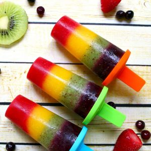Popsicles made of fresh fruit, blended and frozen in rainbow colors