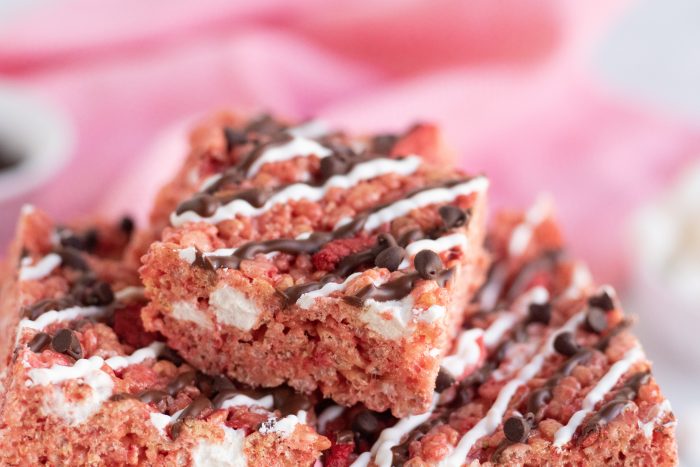 Close up of chocolate topping on Chocolate Covered Strawberry Rice Krispie Treats