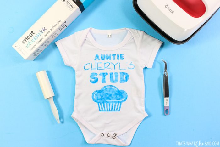 Cricut Infusible Ink baby bodysuit with a design from a transfer sheet