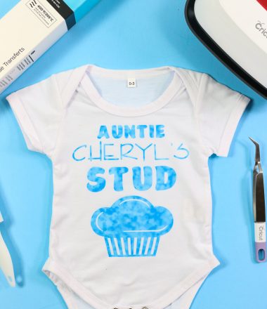 Cricut Infusible Ink baby bodysuit with a design from a transfer sheet - Aunties Stud Muffin