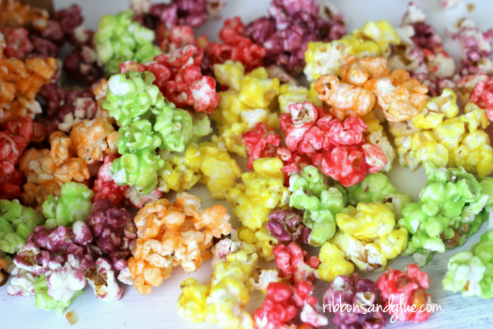 Popcorn with skittle candy coating in rainbow colors