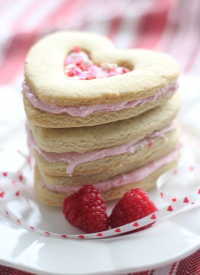 Stack of cookies showing raspberry filling