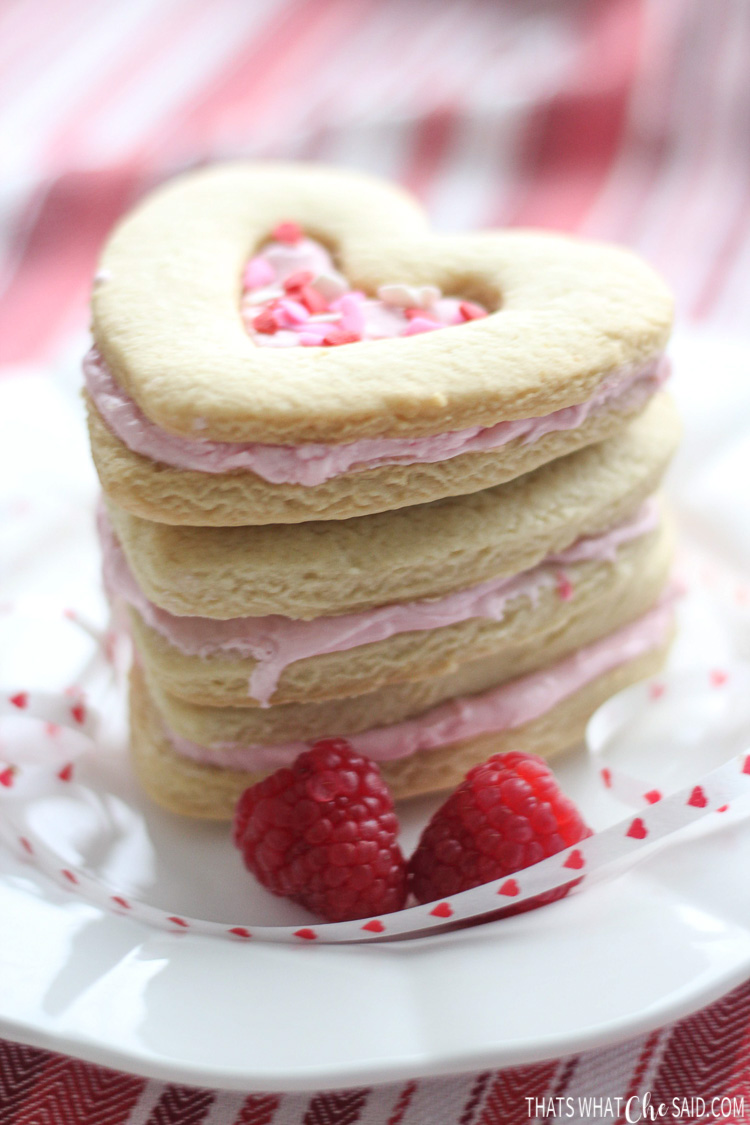 Stack of cookies showing raspberry filling