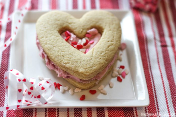 Heart Shortbread Sandwich cookie with Valentine Sprinkles on a plate