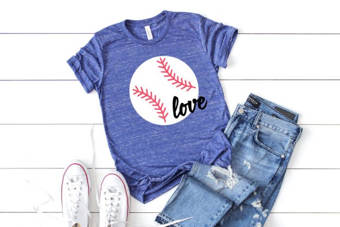 Blue Heather T-Shirt with Baseball design and the word love in iron on vinyl staged with white converse and ripped jeans