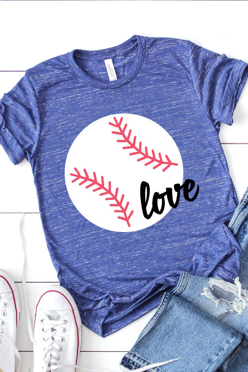 Blue Heather T-Shirt with Baseball design and the word love in iron on vinyl staged with white converse and ripped jeans in Vertical format