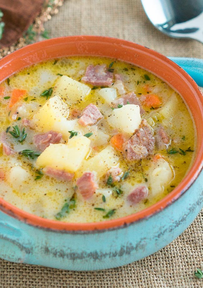 Close of up crock bowl with ham and potato soup