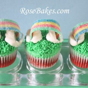 Cupcakes with grass frosting and rainbow candy