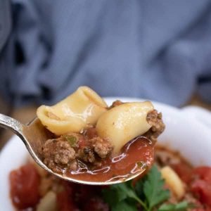 Close up of spoonful of beef tomato macaroni Instant pot soup