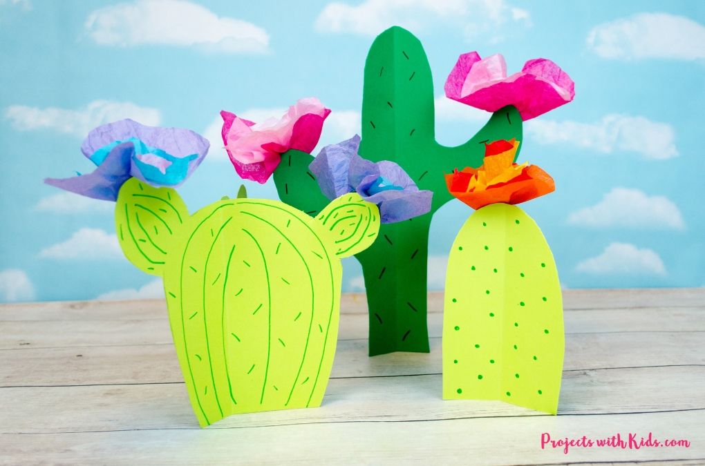 Cactus cut outs with colorful tissue paper flowers.