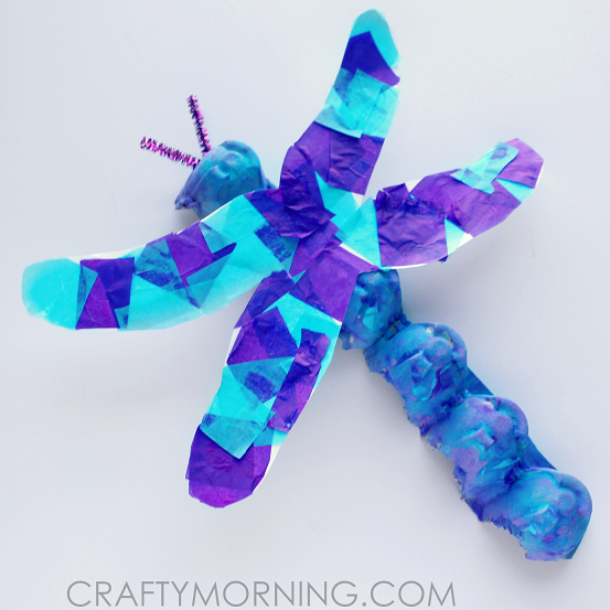 Egg carton upcycled into a blue and purple dragonfly.