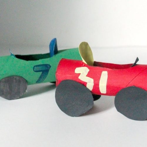 Toilet paper tubes up cycled into racing cars.
