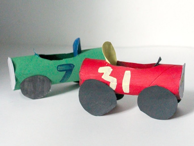 Toilet paper tubes up cycled into racing cars.