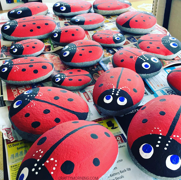 Large rocks painted as ladybugs.