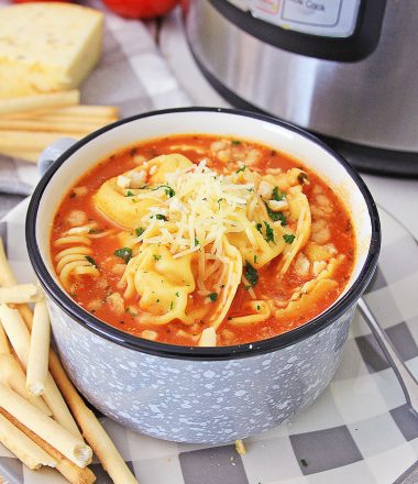 Chicken Parm Soup in front of the Instant pot and a few ingredients