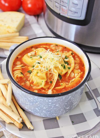 Chicken Parm Soup in front of the Instant pot and a few ingredients