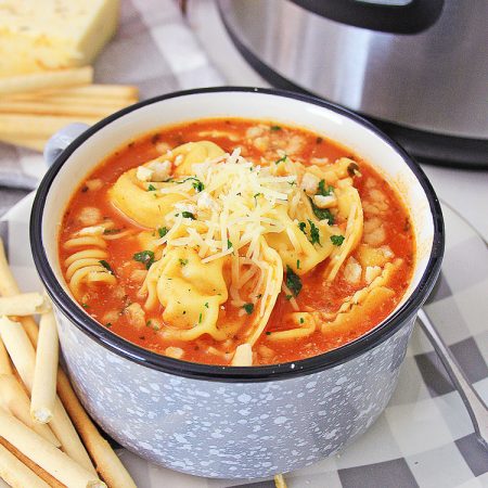 Chicken Parm Soup in front of the Instant pot and a few ingredients