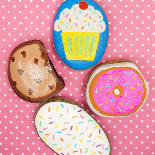 Rocks painted to look like colorful desserts.