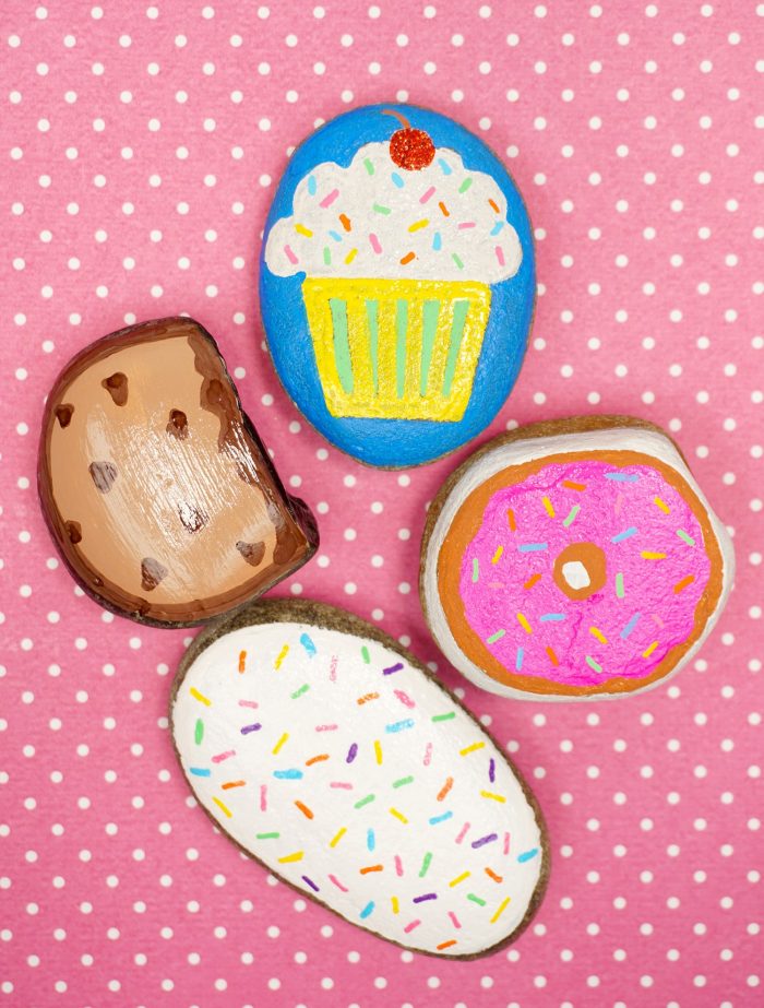 Rocks painted to look like colorful desserts.