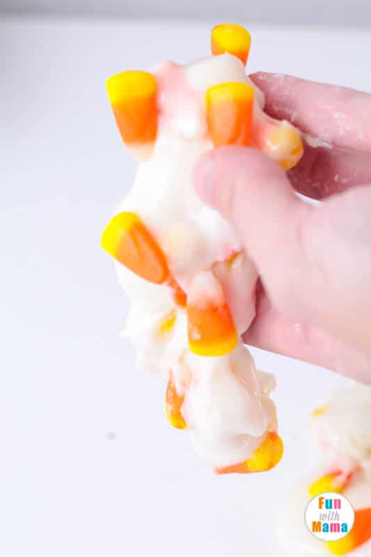 White edible slime with candy corns.