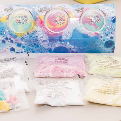 Bath bomb maker kit with bags of bath salts.