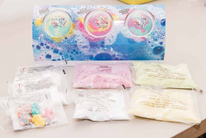 Bath bomb maker kit with bags of bath salts.