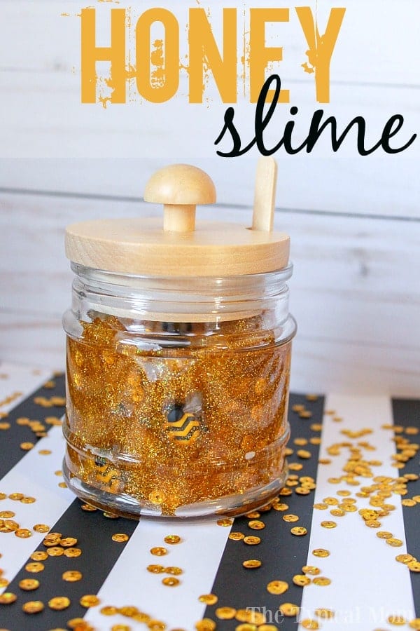 Gold glittery slime with gold sequins and honeybee charms.