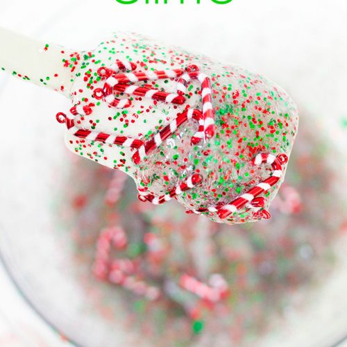 Clear slime with red and green glitter and candy cane charms.