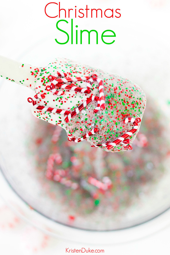 Clear slime with red and green glitter and candy cane charms.
