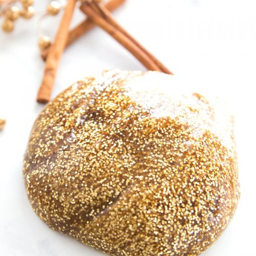 Gingerbread scented gold sparkly slime.