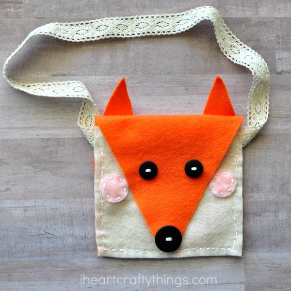 Felt fox head pocket purse.