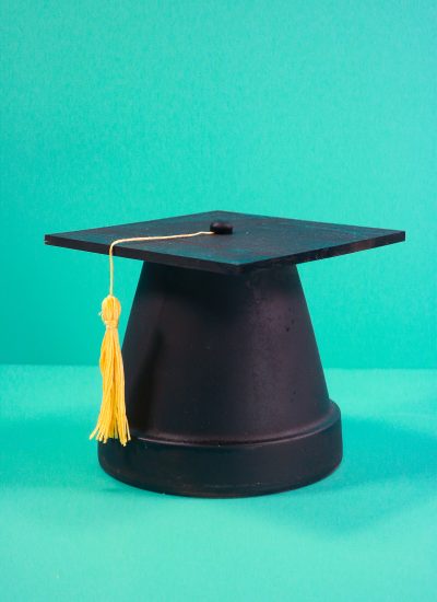 Vertical of finished clay pot grad cap