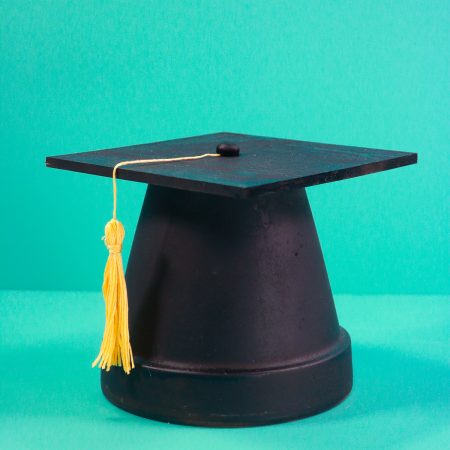 Vertical of finished clay pot grad cap