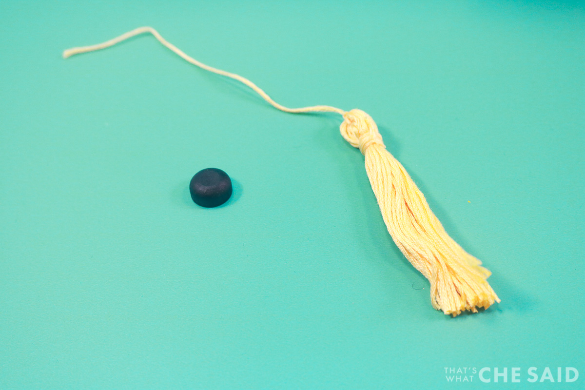 Tassel and wooden cap for top of grad cap