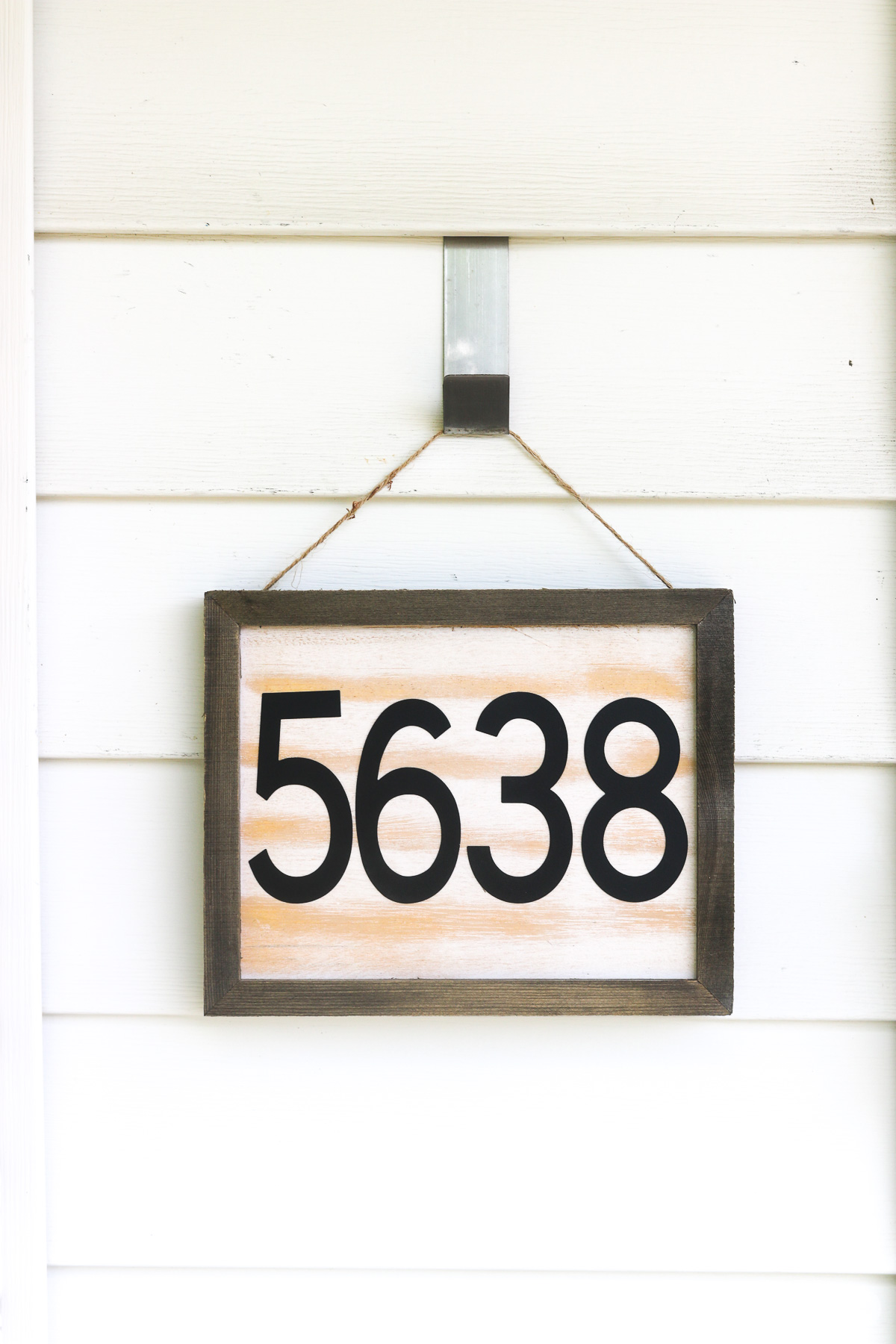 DIY House number sign hanging next to front door - vertical layout
