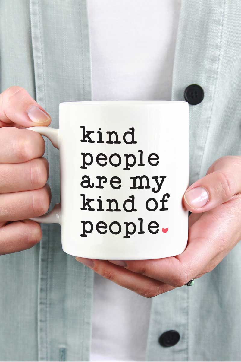 Woman holding White Coffee Mug with Saying "Kind People are My Kind of People" in Vinyl - Square Format