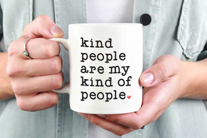 Woman holding White Coffee Mug with Saying "Kind People are My Kind of People" in Vinyl - Horizontal