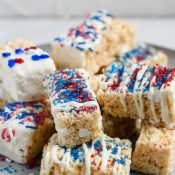 Serving tray full of patriotically decorated Rice Krispie Treats - Vertical Shot